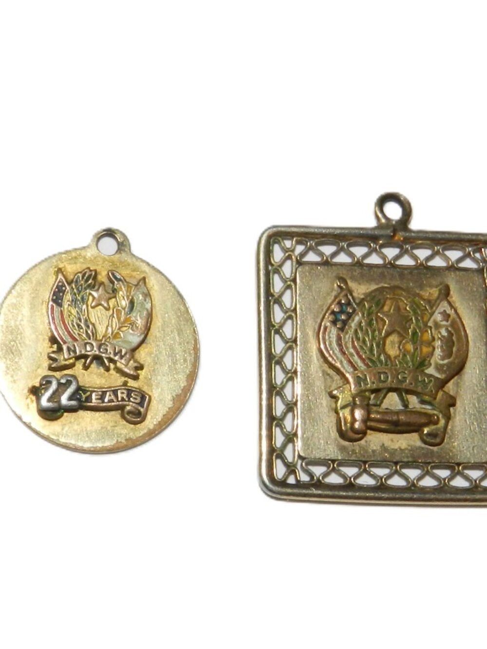 2 Gold-plated (12K) pendants/charms featuring the  penda Daughters of the Golden